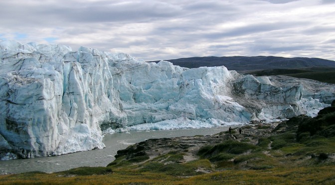 Photo via WikiMedia Commons, The edge of the Greenland icesheet, note the humans standing at the center right hand side for scale. Taken near Kangerlussuaq, Greenland; 8-11-2005 by L. Chang﻿